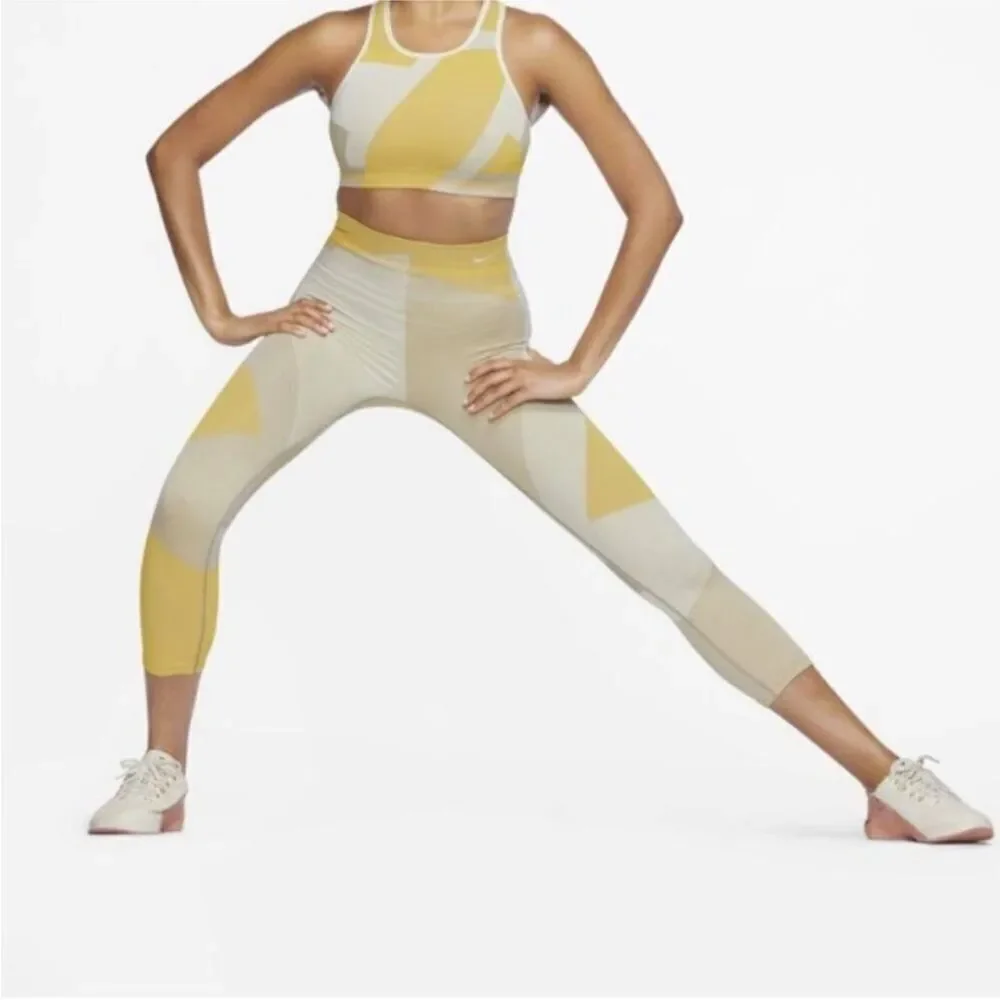 NIKE | Dri Fit Sculpt Icon Clash Cropped Leggings Yellow Gray Tan Women’s Size M